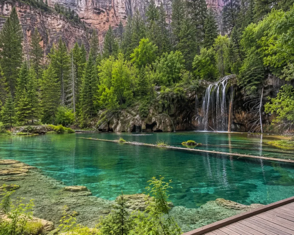 Hanging Lake's turquoise water fed by cascading falls in Glenwood Canyon, Colorado